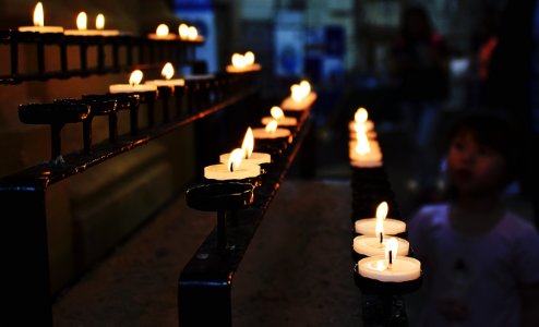 White Tealight Candles Lit During Nighttime