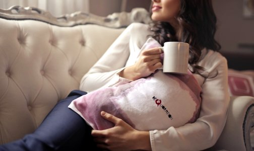 Woman In White Long-sleeved Shirt Holding White Ceramic Mug