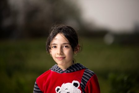 Girl Wearing Red And Black Hoodie photo