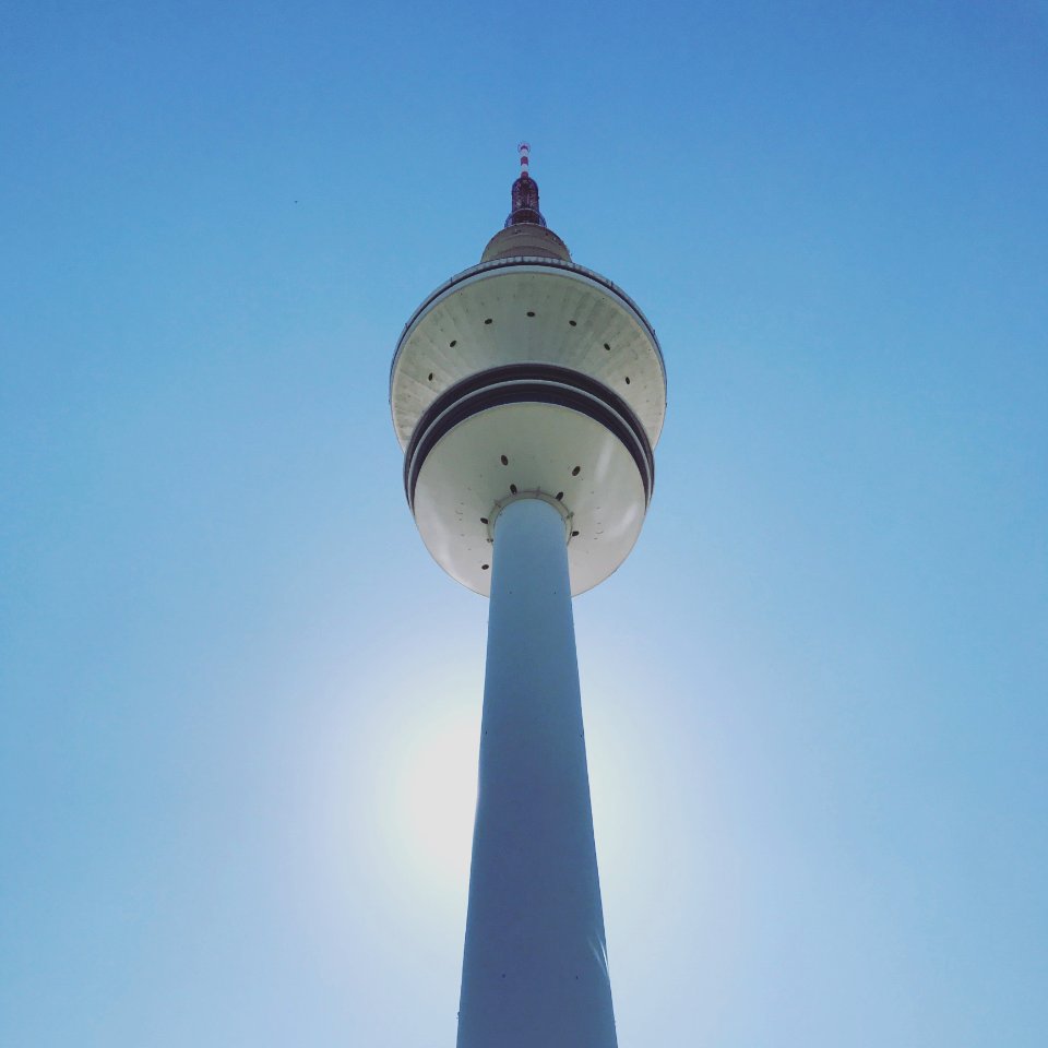 Low-angle Photography Of White And Beige Concrete Tower photo