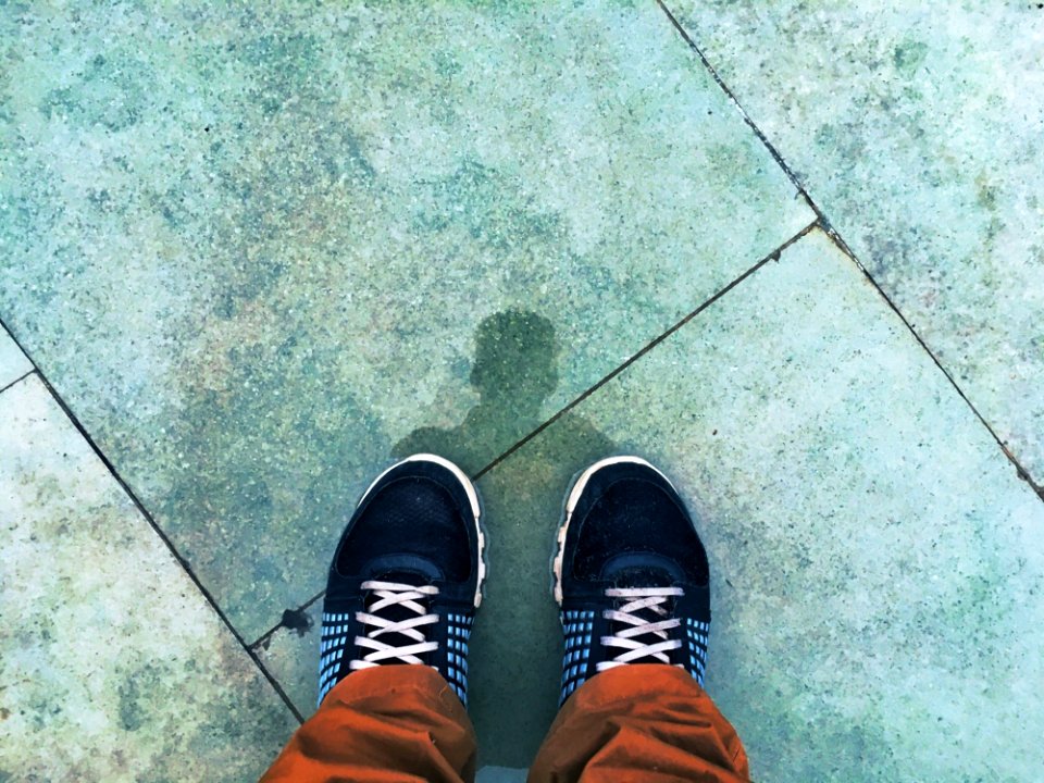 Person Wears Black-and-white Running Shoes