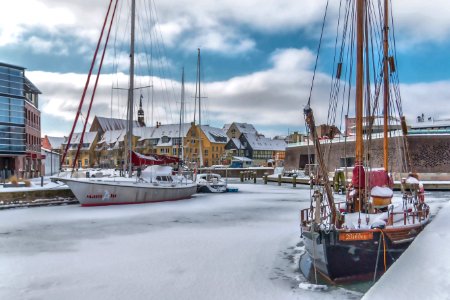 Sail Ships Near Concrete Boardwalk photo