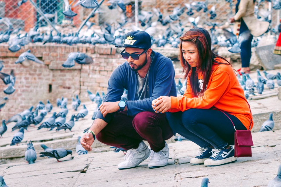 Couple Gray And Orange Long-sleeved Shirts photo