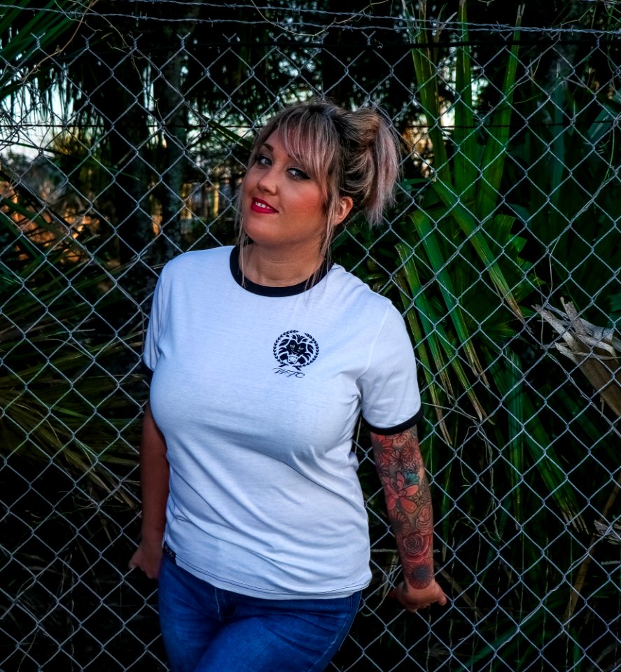 Photo Of Woman Wearing White Ringer Tee And Blue Jeans
