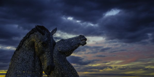 Two Grey Horse Statue Under Cloudy Sky