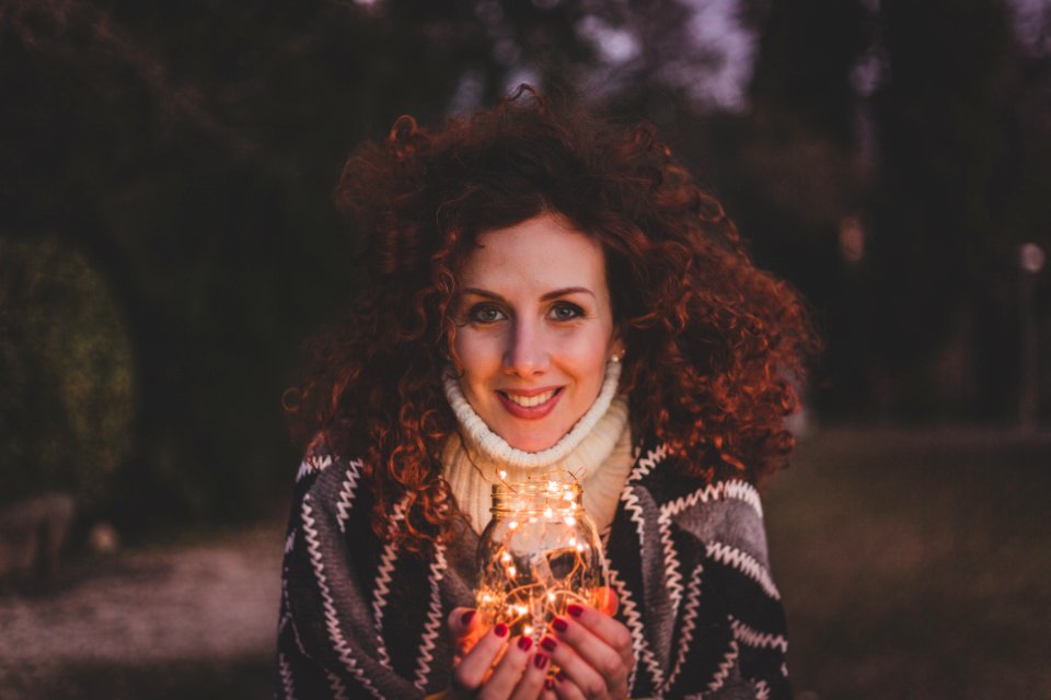 Woman Holding Glass Jar Lantern