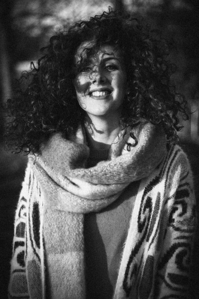 Woman Wearing Open Cardigan And Scarf Grayscale photo