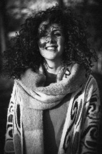 Woman Wearing Open Cardigan And Scarf Grayscale