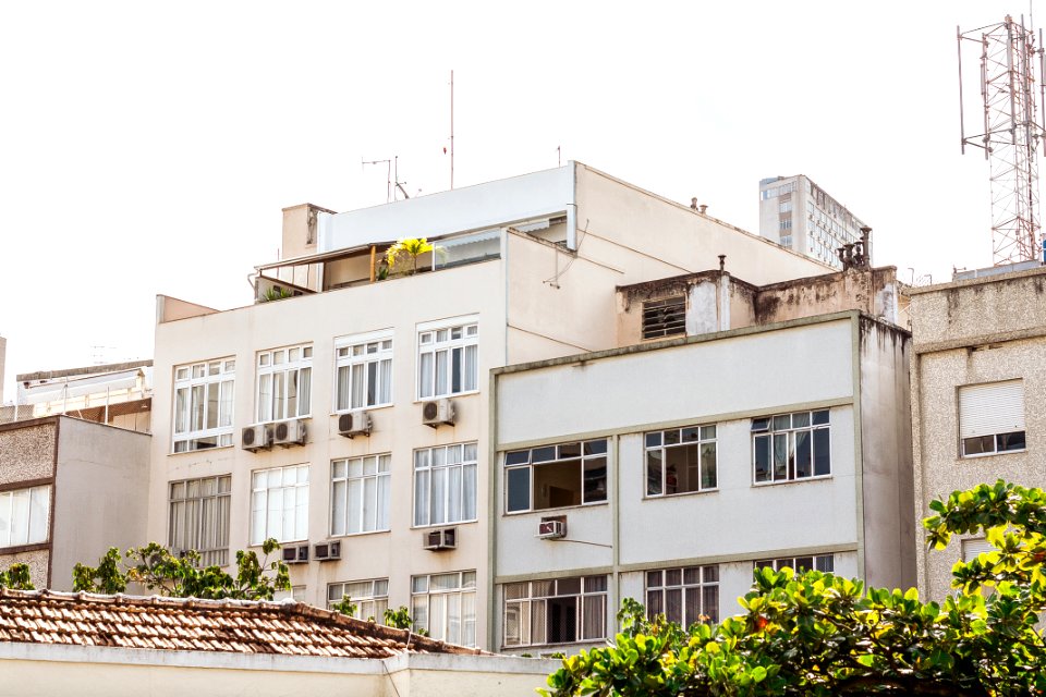 White And Beige Concrete High-rise Building