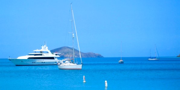 Body Of Water And White Yacht photo