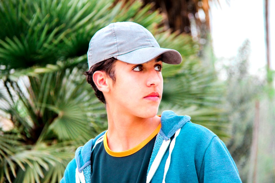 Man Wearing Gray Cap And Blue Jacket photo