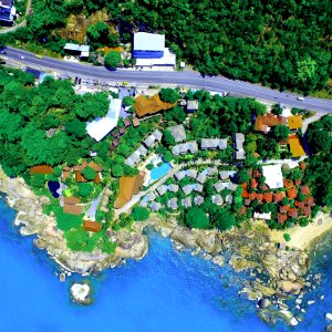Aerial Photography Of Village Near Body Of Water
