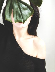 Woman Wearing Black One-shoulder Shirt photo