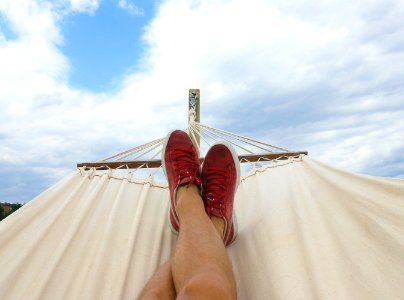 Pair Of Red-and-white Low-top Sneakers photo