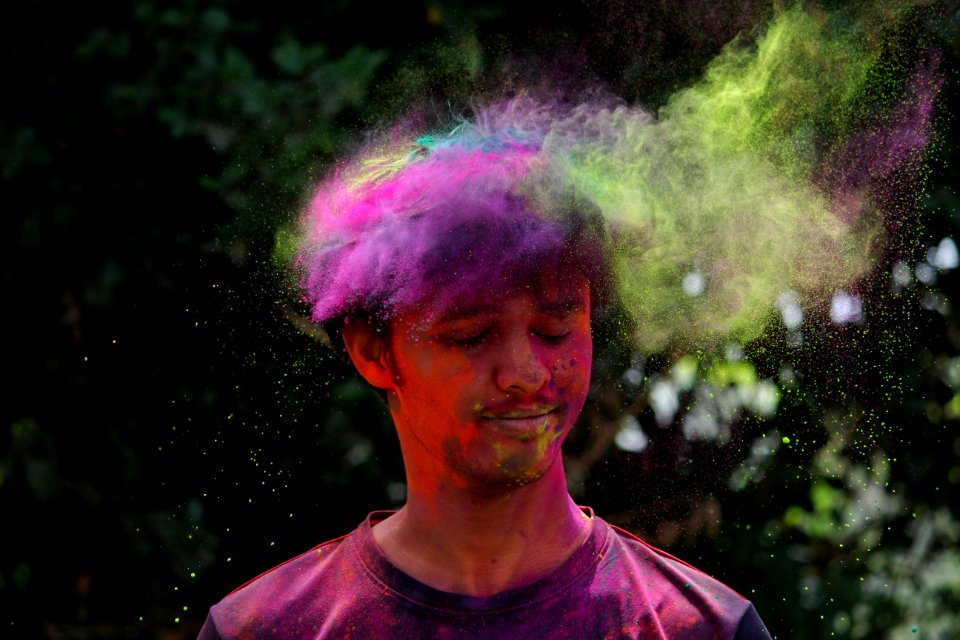 Man Wearing Pink Crew-neck Shirt With Multicolored Powder