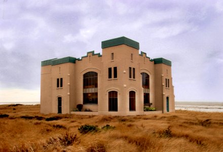 Brown Concrete Mansion At The Middle Of Nowhere photo