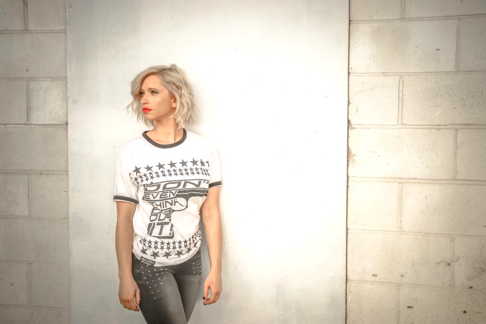 Photography Of A Woman Wearing White T-Shirt