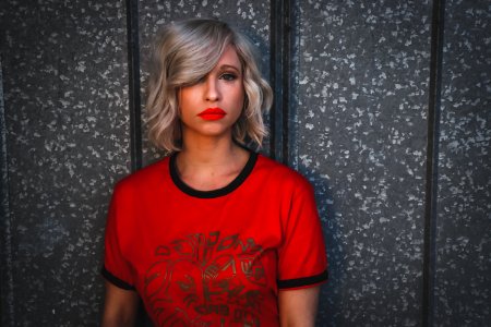 Woman Wearing Red Shirt With Red Lipstick photo