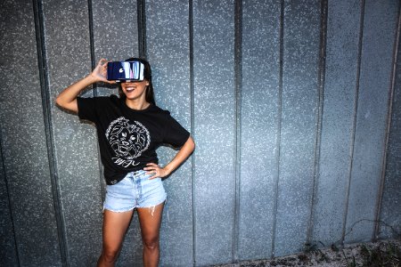 Photo Of Woman Using Vr Headset photo