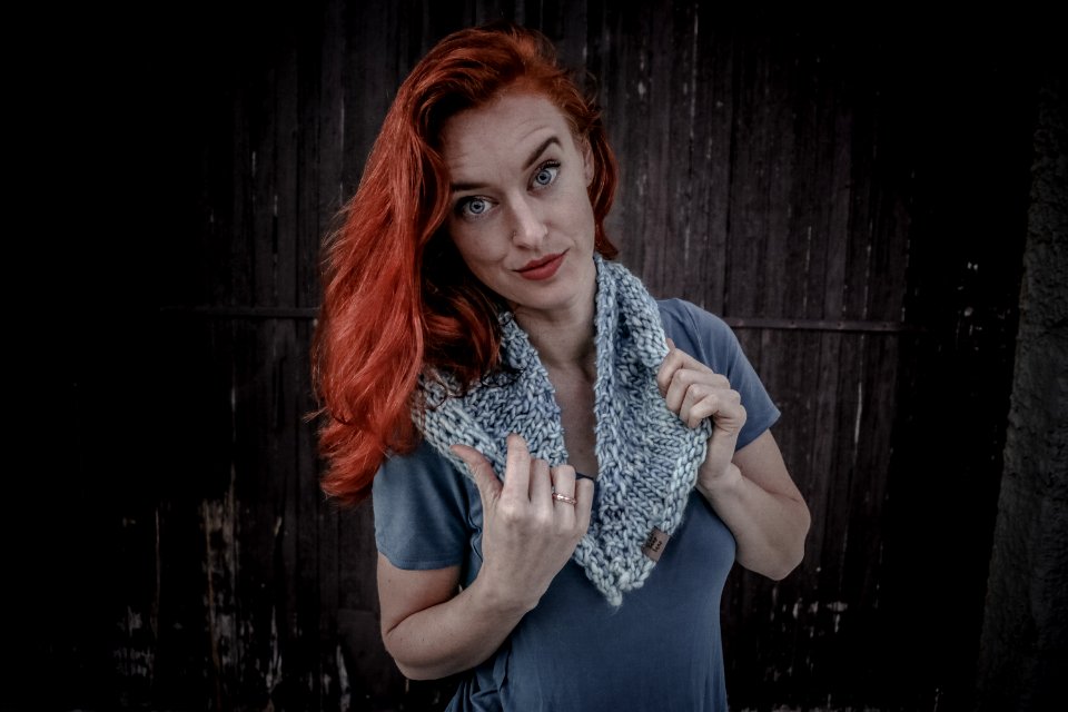 Woman Wearing White And Gray Scarf