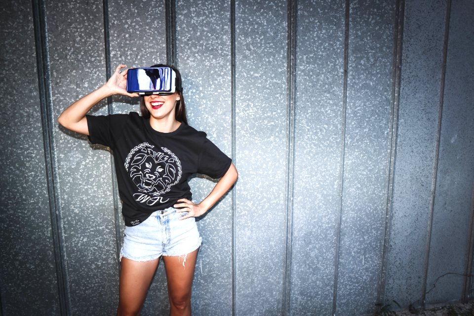 Woman In Black Crew-neck T-shirt Wearing Blue Vr Goggles