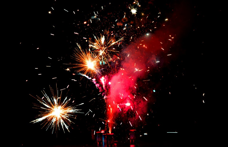 Red And Yellow Fireworks During Night Time