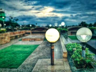 Green Grass With Gray Concrete Pavement Frame