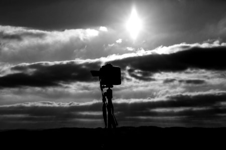 Grayscale Photo Of Camera Under The Sun photo