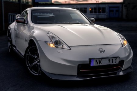 Photo Of White Nissan Car