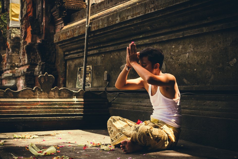 Man Wearing White Tank Top Praying photo