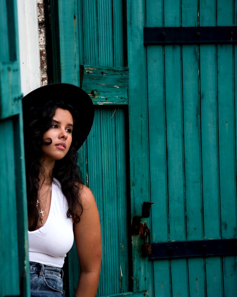 Woman In White Tank Tops And Blue Jeans photo