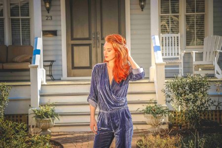 Red Haired Woman Wearing Blue Long-sleeve Jumpsuit photo