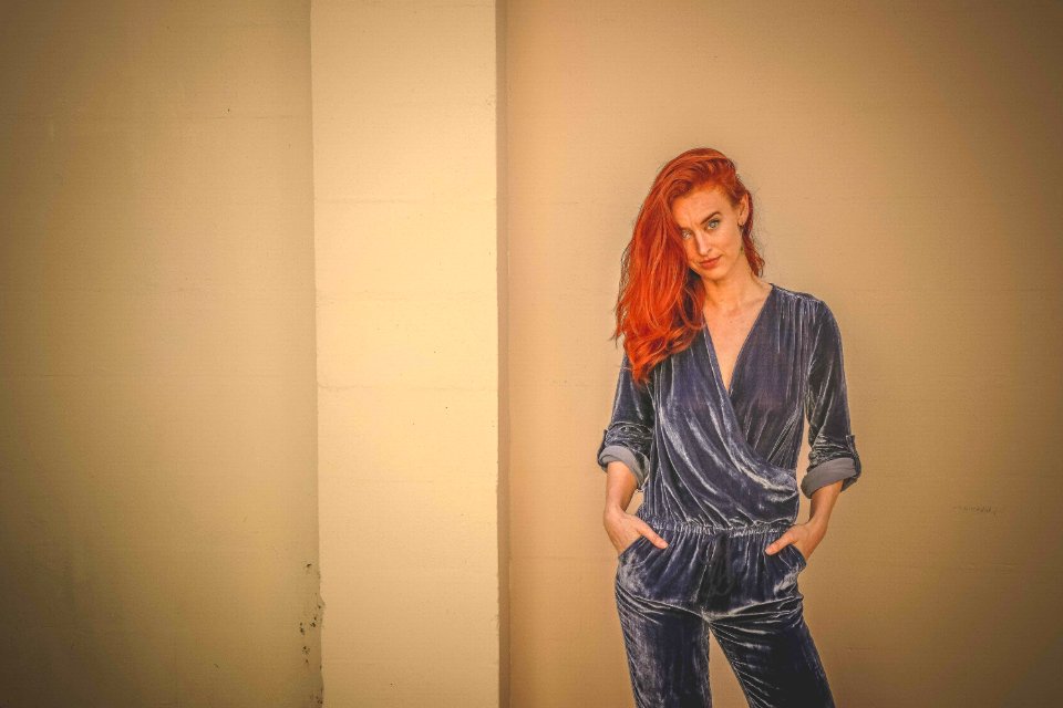 Woman Wearing Black Velvet Surplice Long-sleeved Jumpsuit