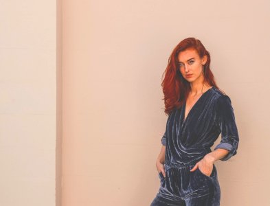 Woman Wearing Black Velvet Long-sleeved Jumpsuit photo