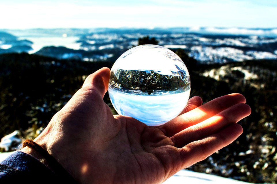 Photo Of Person Holding Ball