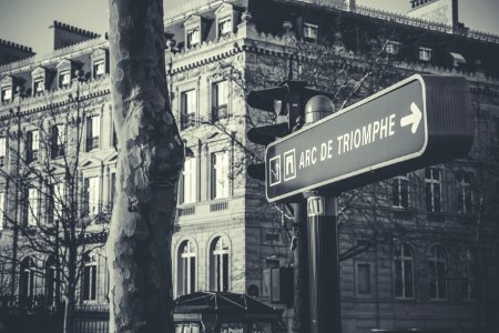Grayscale Photo Of Black And White Arc De Triomphe Street Sign photo