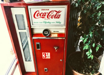 Red And White Coca-cola Vending Machine photo