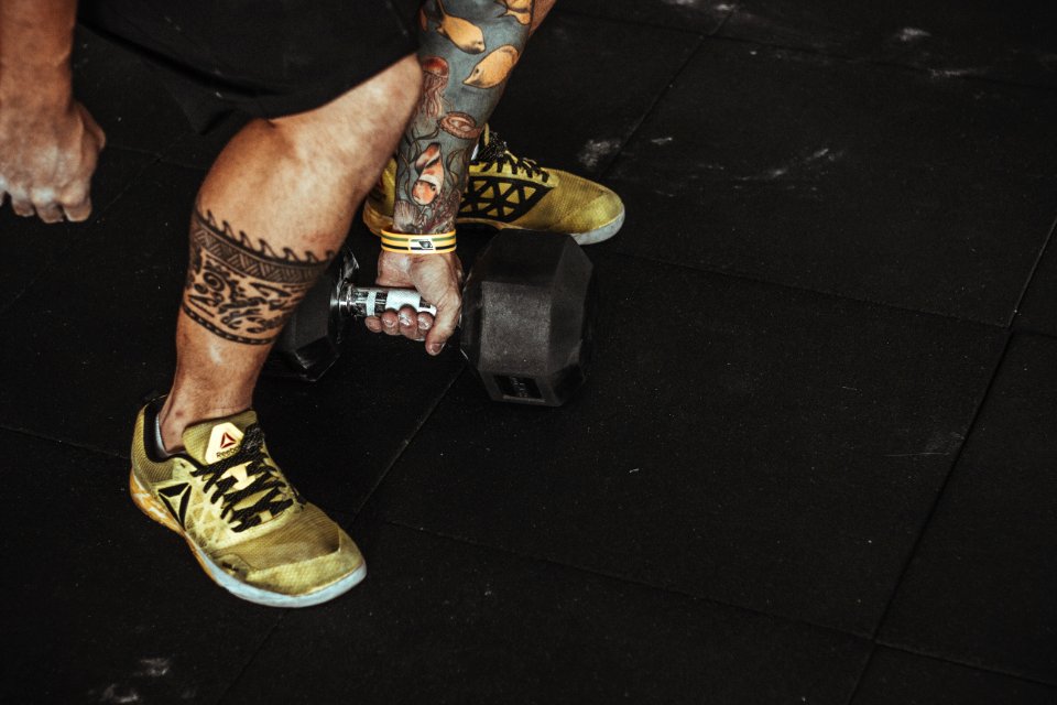 Man Wearing Yellow Running Shoes