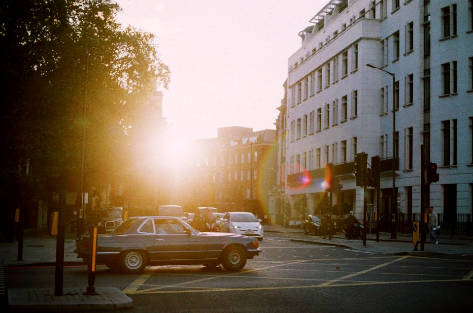 Grey Coupe On Road Near Building photo