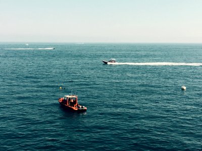Two Boats On Calm Ocean Waters photo