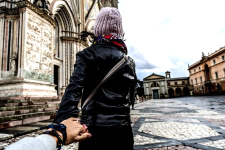 Photo Of Man Holding Womans Hand photo