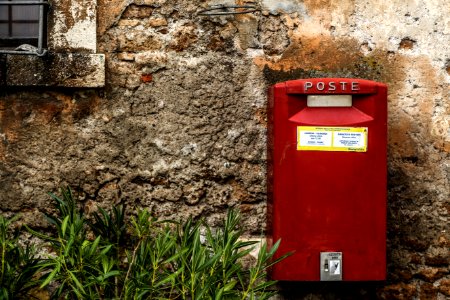 Red Mail Box Beside Green Grass