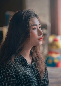 Woman Wearing White And Black Checkered Dress Top