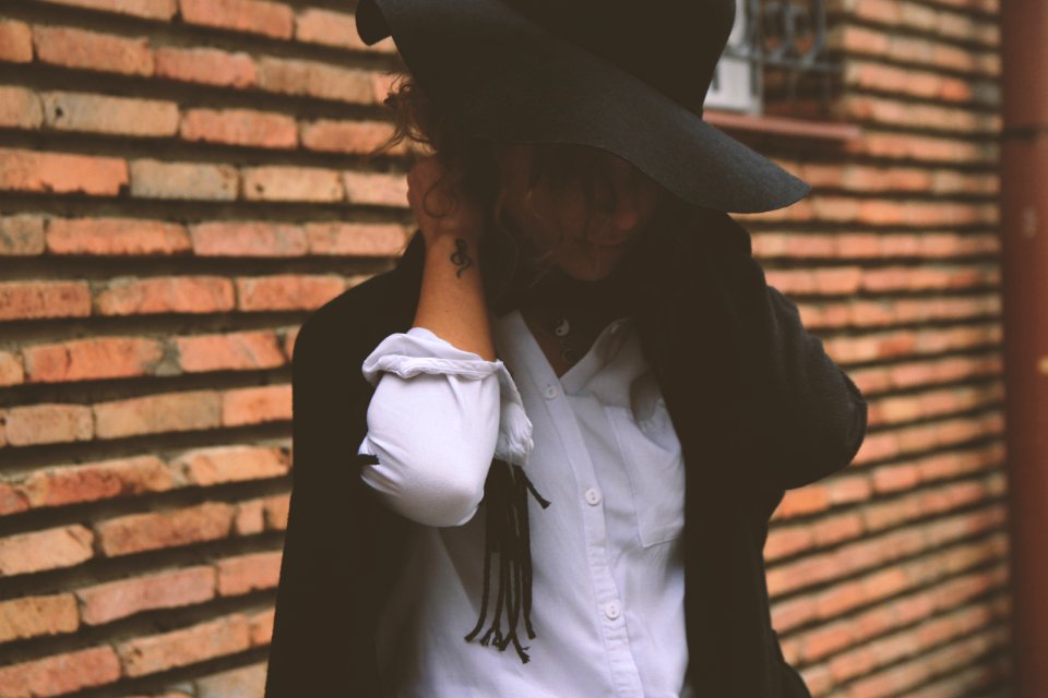Woman Wearing White Dress Shirt And Black Coat