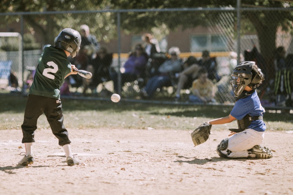Two Children Playing Baseball