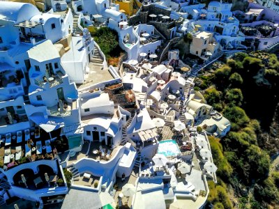 Aerial Photo Of White Buildings Near Trees At Daytime photo