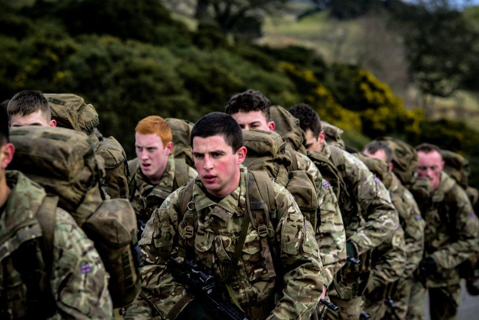 Armies In Camouflage Uniform Lining Up Closeup Photo