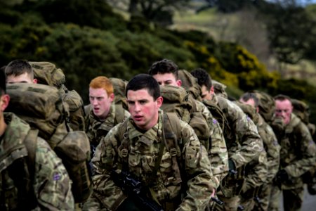 Armies In Camouflage Uniform Lining Up Closeup Photo