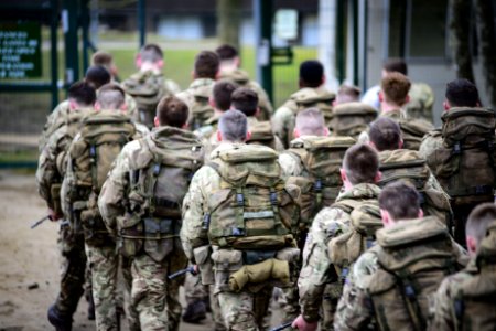Group Of Soldiers In Full Battle Gear