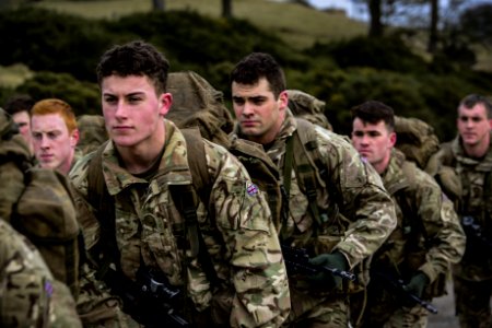 Group Of Military Carrying Rifles photo